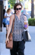 LILY COLLINS Out Shopping in Beverly Hills 10/01/2015