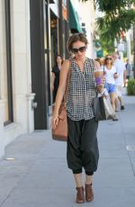 LILY COLLINS Out Shopping in Beverly Hills 10/01/2015