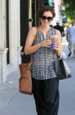 LILY COLLINS Out Shopping in Beverly Hills 10/01/2015