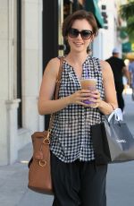 LILY COLLINS Out Shopping in Beverly Hills 10/01/2015