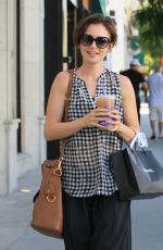 LILY COLLINS Out Shopping in Beverly Hills 10/01/2015