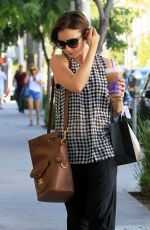 LILY COLLINS Out Shopping in Beverly Hills 10/01/2015