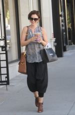LILY COLLINS Out Shopping in Beverly Hills 10/01/2015
