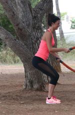 LUCY MECKLENBURGH Working Out with Her Sister Christie at a park in Ibiza 10/15/2015