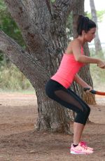 LUCY MECKLENBURGH Working Out with Her Sister Christie at a park in Ibiza 10/15/2015