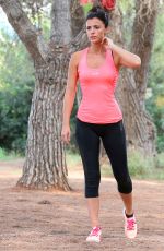 LUCY MECKLENBURGH Working Out with Her Sister Christie at a park in Ibiza 10/15/2015