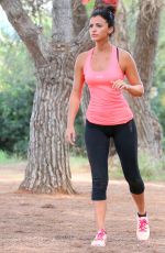 LUCY MECKLENBURGH Working Out with Her Sister Christie at a park in Ibiza 10/15/2015