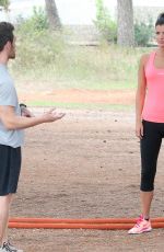 LUCY MECKLENBURGH Working Out with Her Sister Christie at a park in Ibiza 10/15/2015