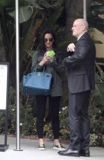 OLIVIA MUNN Waits For Her Car After Having Lunch in Los Angeles 10/28/2015