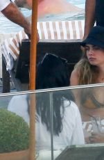 RIHANNA and CARA DELEVINGNE in Bikinis in Rio de Janeiro 09/27/2015