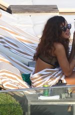 RIHANNA and CARA DELEVINGNE in Bikinis in Rio de Janeiro 09/27/2015