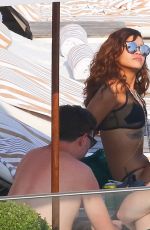 RIHANNA and CARA DELEVINGNE in Bikinis in Rio de Janeiro 09/27/2015
