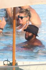 RIHANNA and CARA DELEVINGNE in Bikinis in Rio de Janeiro 09/27/2015