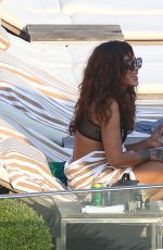 RIHANNA and CARA DELEVINGNE in Bikinis in Rio de Janeiro 09/27/2015