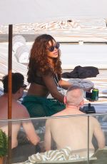 RIHANNA and CARA DELEVINGNE in Bikinis in Rio de Janeiro 09/27/2015