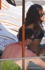 RIHANNA and CARA DELEVINGNE in Bikinis in Rio de Janeiro 09/27/2015