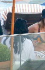 RIHANNA and CARA DELEVINGNE in Bikinis in Rio de Janeiro 09/27/2015