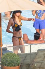 RIHANNA and CARA DELEVINGNE in Bikinis in Rio de Janeiro 09/27/2015