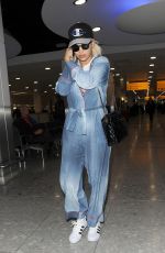 RITA ORA Arrives at Heathrow Airport in London 10/17/2015