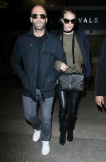 ROSIE HUNTINGTON-WHITELEY and Jason Statham at Los Angeles International Airport 10/07/2015