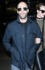 ROSIE HUNTINGTON-WHITELEY and Jason Statham at Los Angeles International Airport 10/07/2015