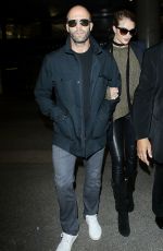 ROSIE HUNTINGTON-WHITELEY and Jason Statham at Los Angeles International Airport 10/07/2015