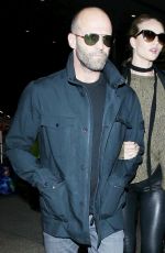 ROSIE HUNTINGTON-WHITELEY and Jason Statham at Los Angeles International Airport 10/07/2015