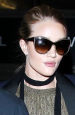 ROSIE HUNTINGTON-WHITELEY and Jason Statham at Los Angeles International Airport 10/07/2015