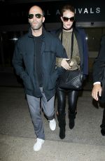 ROSIE HUNTINGTON-WHITELEY and Jason Statham at Los Angeles International Airport 10/07/2015