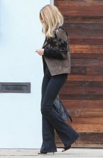 ROSIE HUNTINGTON-WHITELEY Arrives at Her Home in Los Angeles 10/16/2015