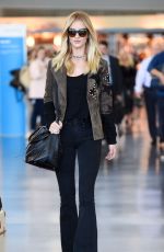 ROSIE HUNTINGTON-WHITELEY Arrives at JFK airport in New York 10/15/2015
