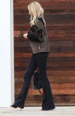 ROSIE HUNTINGTON-WHITELEY Arrives at LAX Airport in Los Angeles 10/16/2015