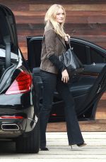 ROSIE HUNTINGTON-WHITELEY Arrives at LAX Airport in Los Angeles 10/16/2015