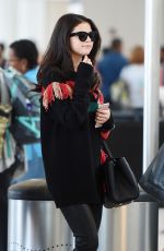 SELENA GOMEZ Arrives at JFK airport in New York 10/15/2015