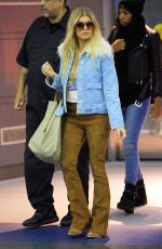 STACY FERGIE FERGUSON Arrives at JFK Airport in New York 10/21/2015
