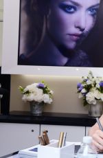 AMANDA SEYFRIED at Espace Cle De Peau Beaute at Bergdorf Goodman in New York 11/18/15