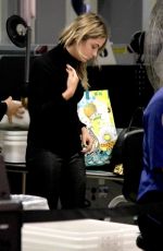ASHLEY BENSON at at TSA Checkpoint at LAX Airport in Los Angeles