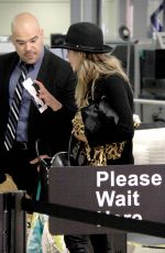 ASHLEY BENSON at at TSA Checkpoint at LAX Airport in Los Angeles
