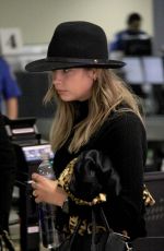 ASHLEY BENSON at at TSA Checkpoint at LAX Airport in Los Angeles
