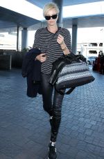 CHARLIZE THERON Arrives at Los Angeles International Airport 11/08/2015