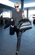 CHARLIZE THERON Arrives at Los Angeles International Airport 11/08/2015
