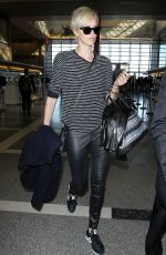 CHARLIZE THERON Arrives at Los Angeles International Airport 11/08/2015