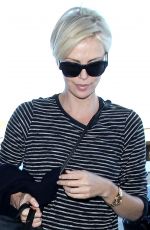 CHARLIZE THERON Arrives at Los Angeles International Airport 11/08/2015