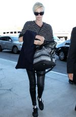 CHARLIZE THERON Arrives at Los Angeles International Airport 11/08/2015