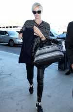 CHARLIZE THERON Arrives at Los Angeles International Airport 11/08/2015