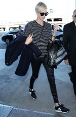 CHARLIZE THERON Arrives at Los Angeles International Airport 11/08/2015