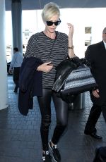 CHARLIZE THERON Arrives at Los Angeles International Airport 11/08/2015