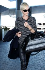 CHARLIZE THERON Arrives at Los Angeles International Airport 11/08/2015