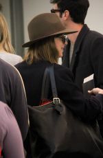 DAKOTA JOHNSON Arrives at LAX Airport in Los Angeles 11/19/2015