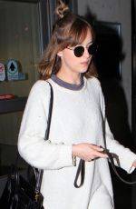 DAKOTA JOHNSON Arrives at Los Angeles International Airport 11/06/2015